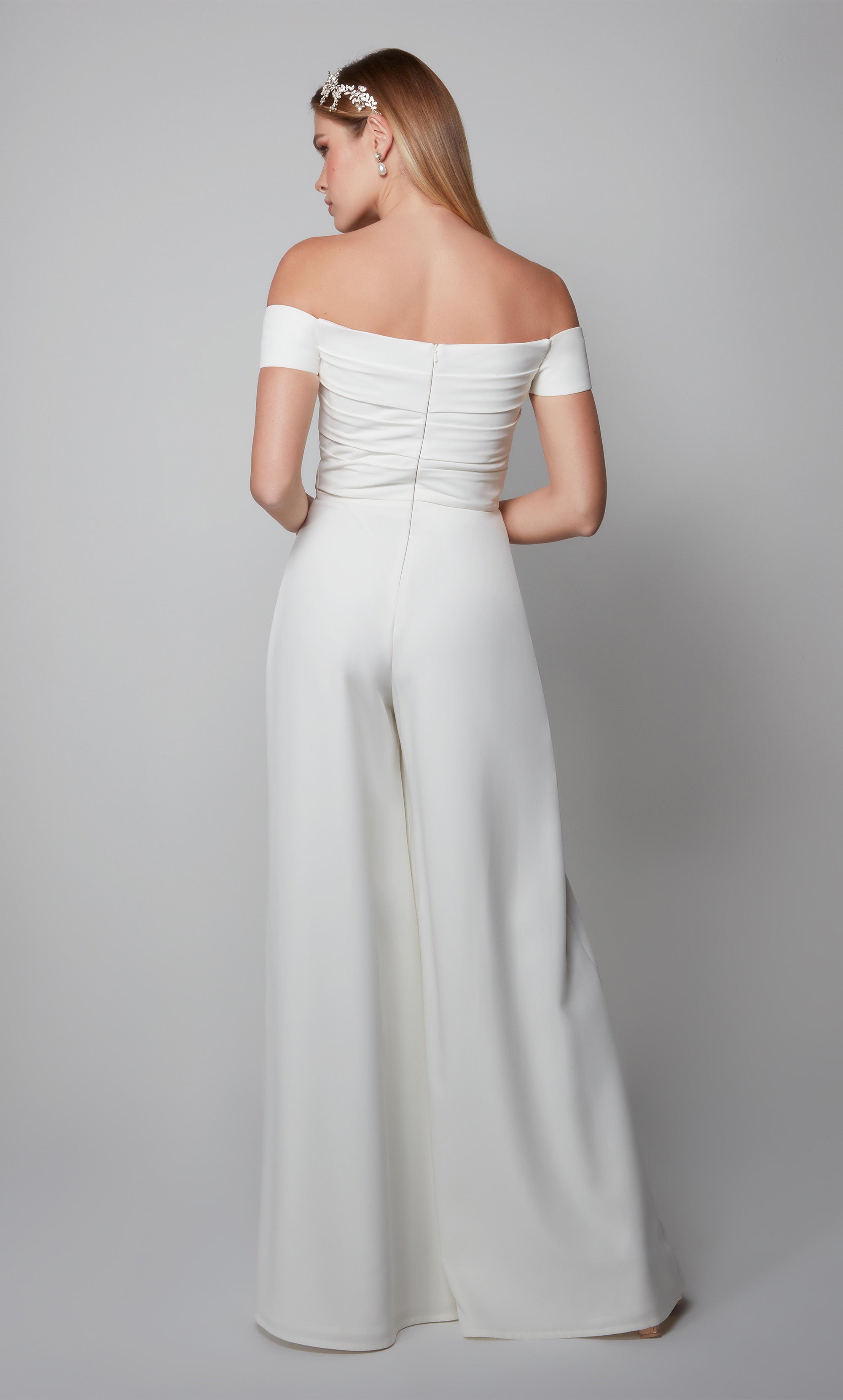 Ivory wedding jumpsuit with an elegant off the shoulder pleated bodice. Color-SWATCH_70014__IVORY