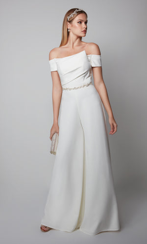 Ivory formal jumpsuit with an elegant off the shoulder pleated bodice.