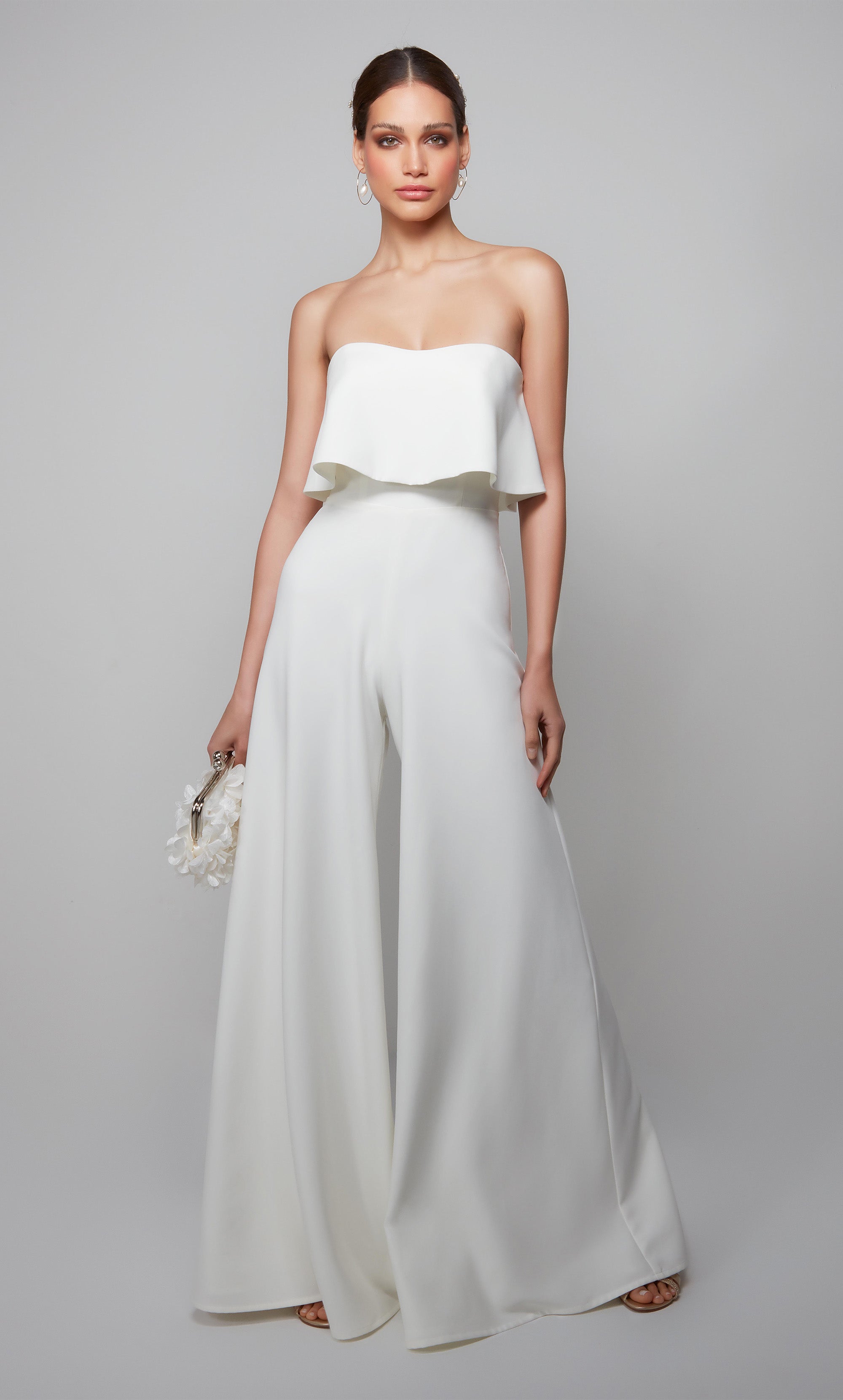 Sleeveless wedding jumpsuit with a ruffle top in ivory. Color-SWATCH_70015__IVORY