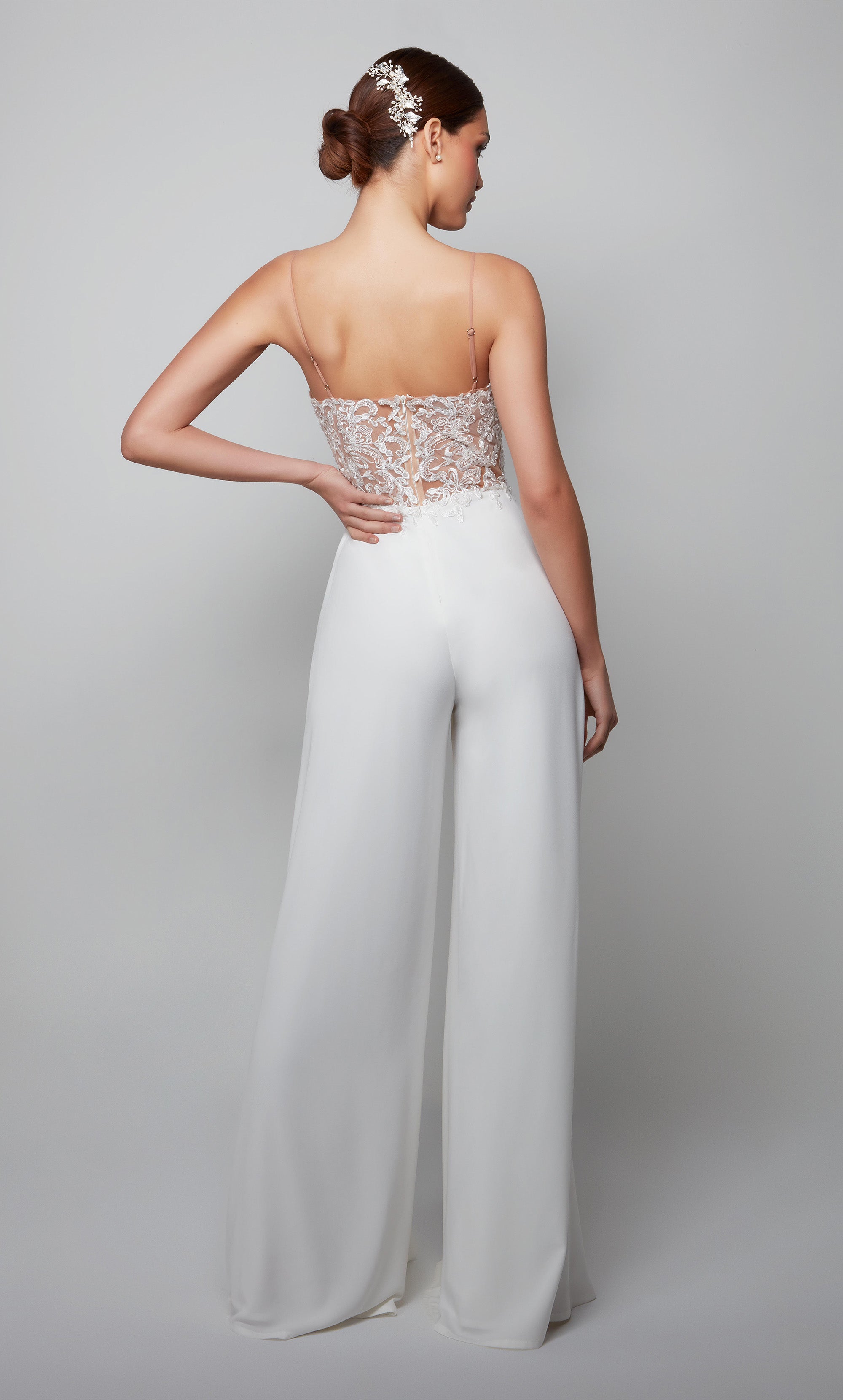 Ivory lace wedding jumpsuit with a sheer V neck bodice. Color-SWATCH_70017__IVORY