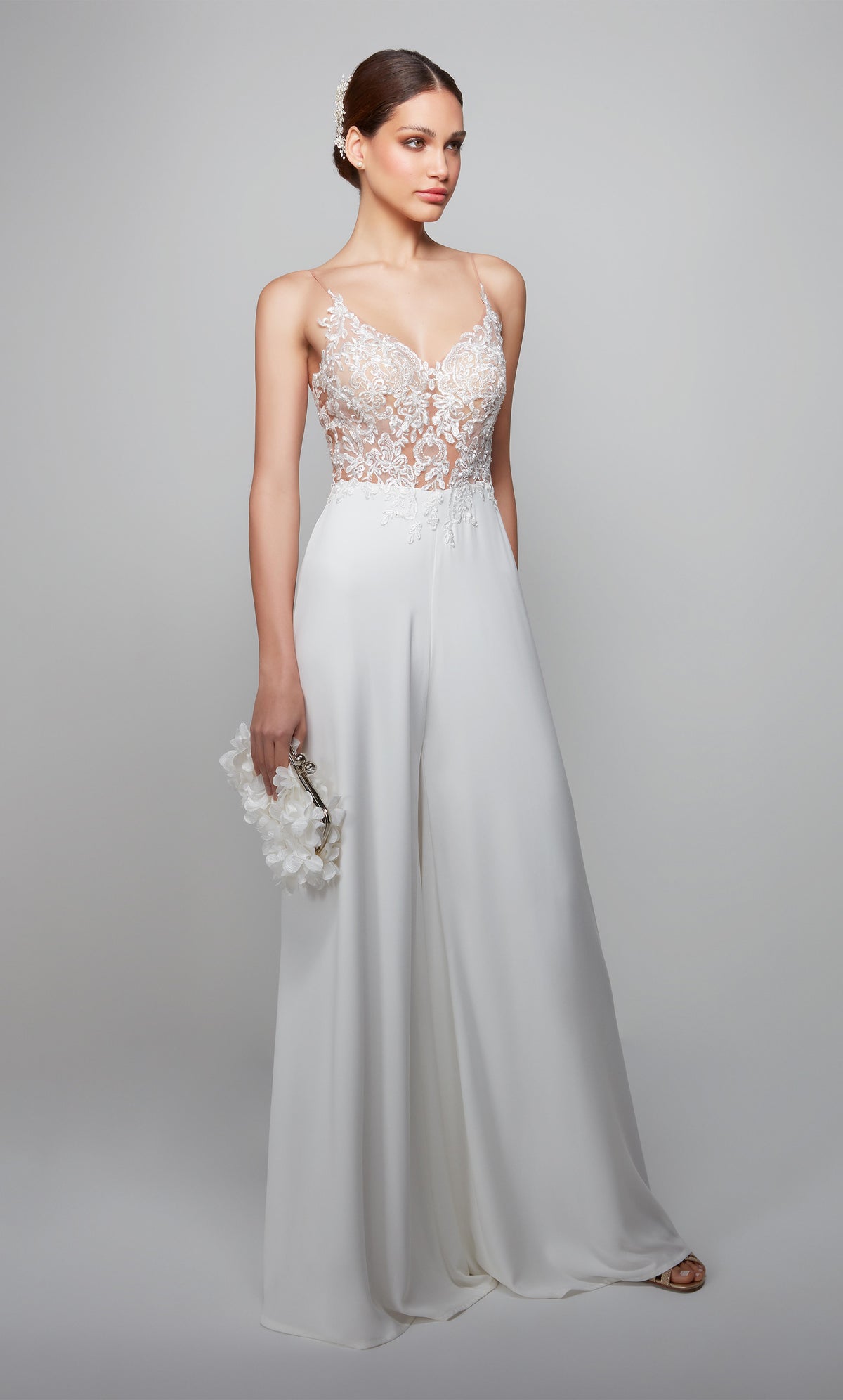 Ivory lace wedding jumpsuit with a sheer V neck bodice.