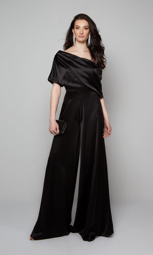 Draped one shoulder jumpsuit with in black.