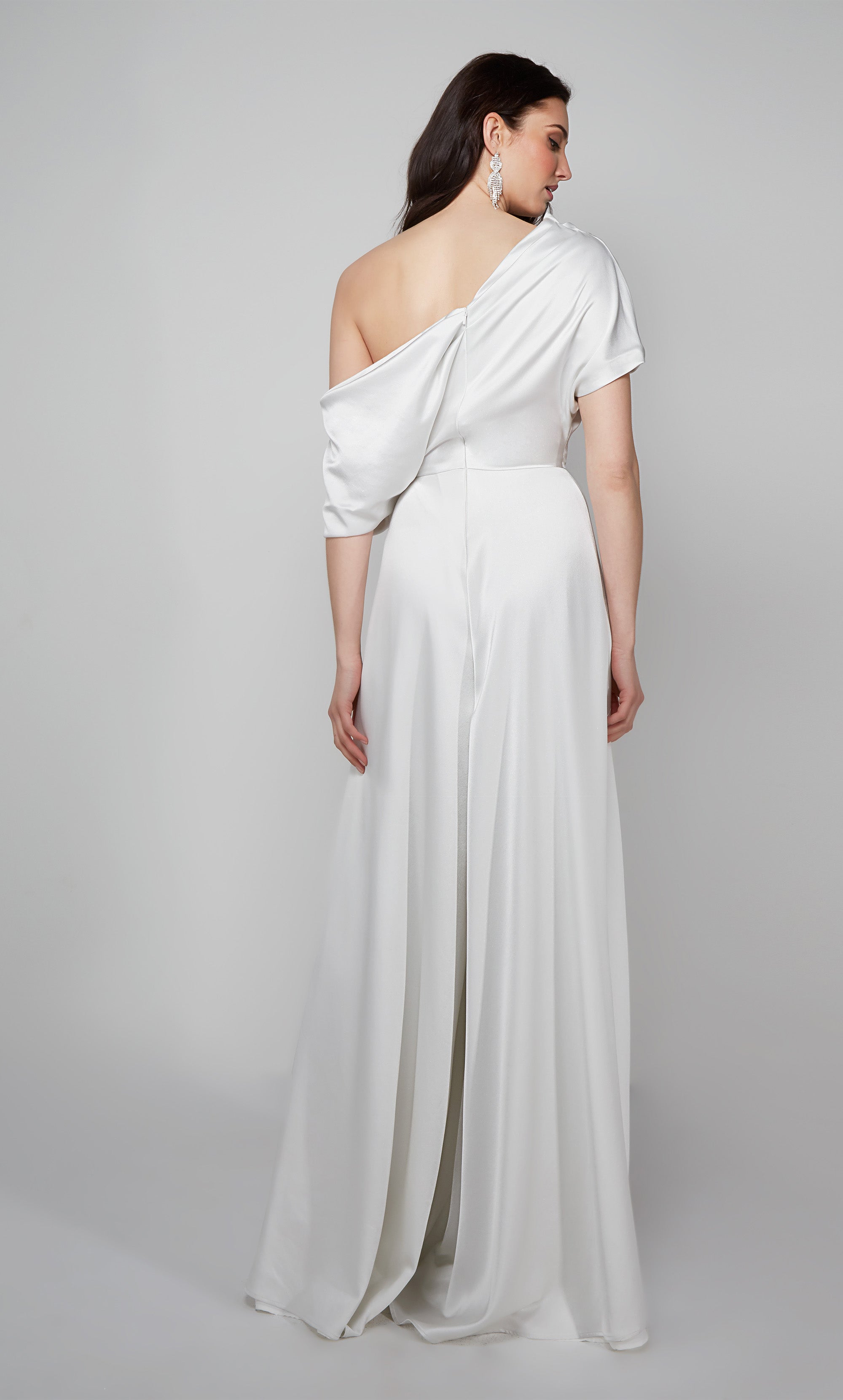 One shoulder jumpsuit with draped bodice in ivory.