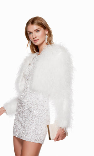 A feathered, white cropped jacket with long sleeves, perfect for a formal event.