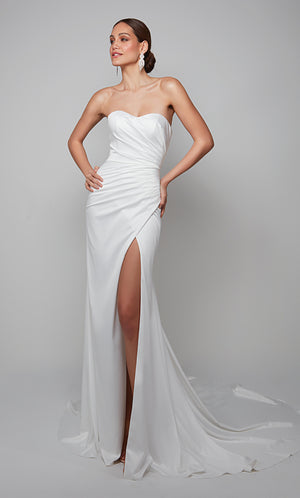 Chic strapless asymmetrical wedding dress with a front slit in diamond white.
