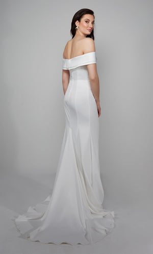 Simple off the shoulder wedding dress with a zip up back and train in white.