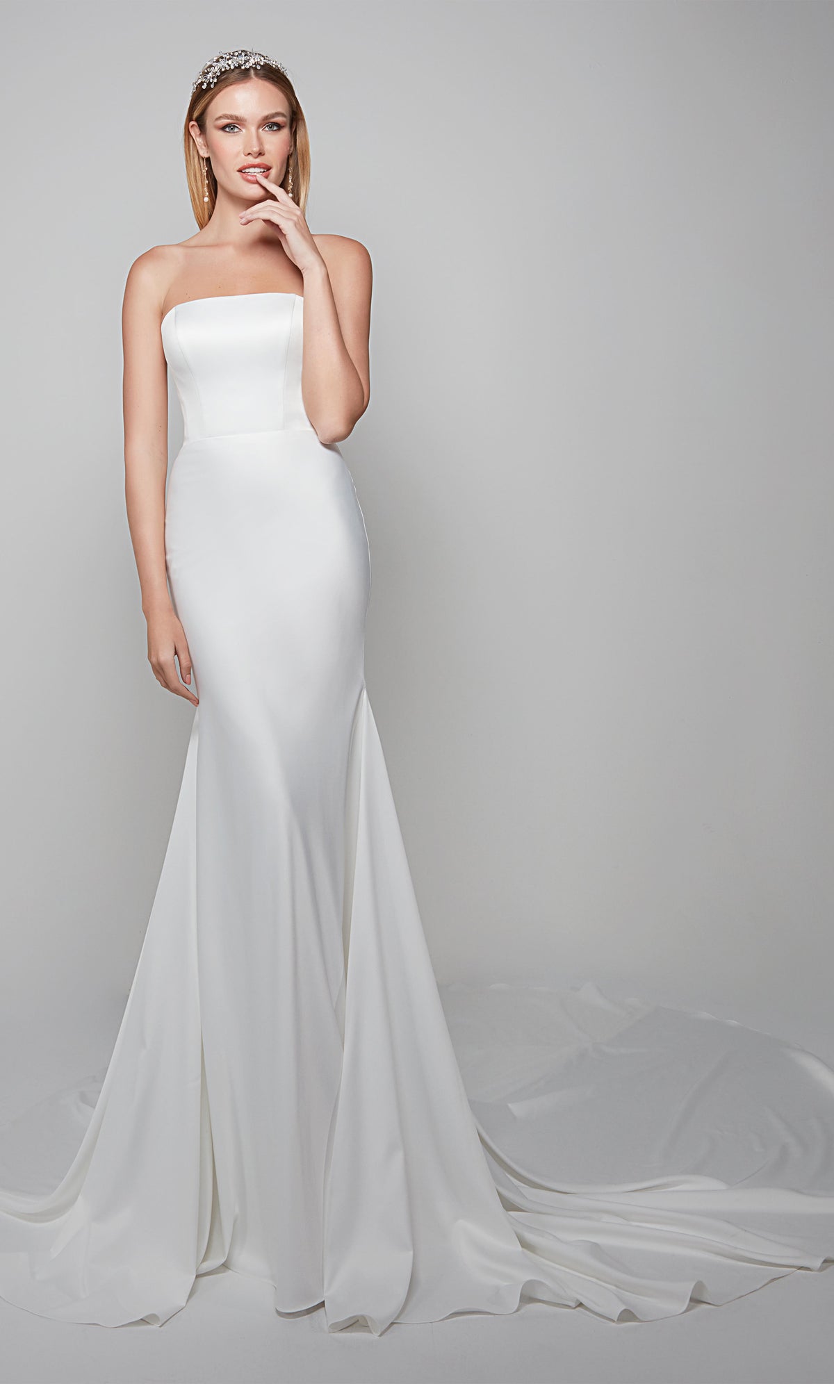 Strapless satin wedding dress cut in a fit and flare silhouette in diamond white color. Color-SWATCH_7060__DIAMOND-WHITE