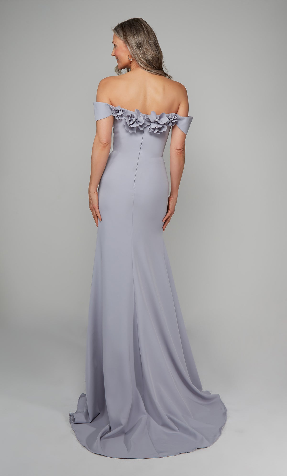 Ice blue fit and flare mother of the bride dress featuring an off the shoulder bodice enhanced with a beautiful flower volant and train.