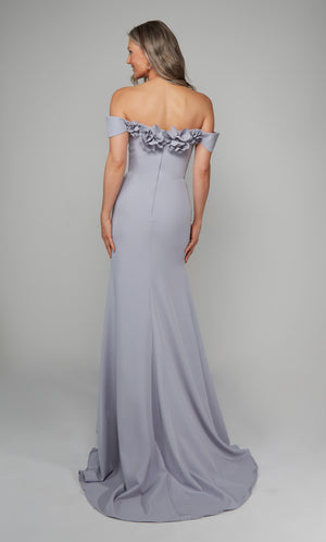 Ice blue fit and flare mother of the bride dress featuring an off the shoulder bodice enhanced with a beautiful flower volant and train.
