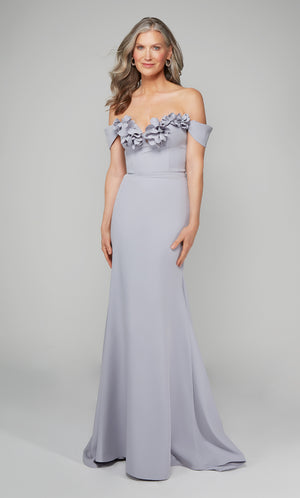 Ice blue fit and flare gala dress featuring an off the shoulder bodice enhanced with a beautiful flower volant.
