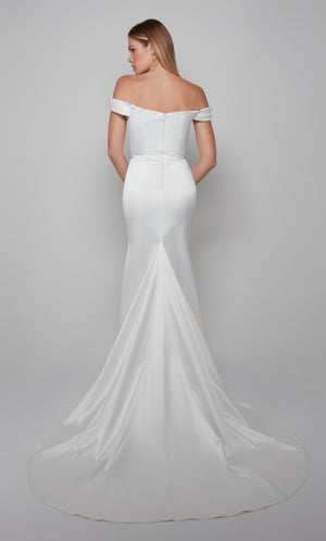 Simple wedding dress with an off the shoulder neckline, zip up back, and train in ivory.