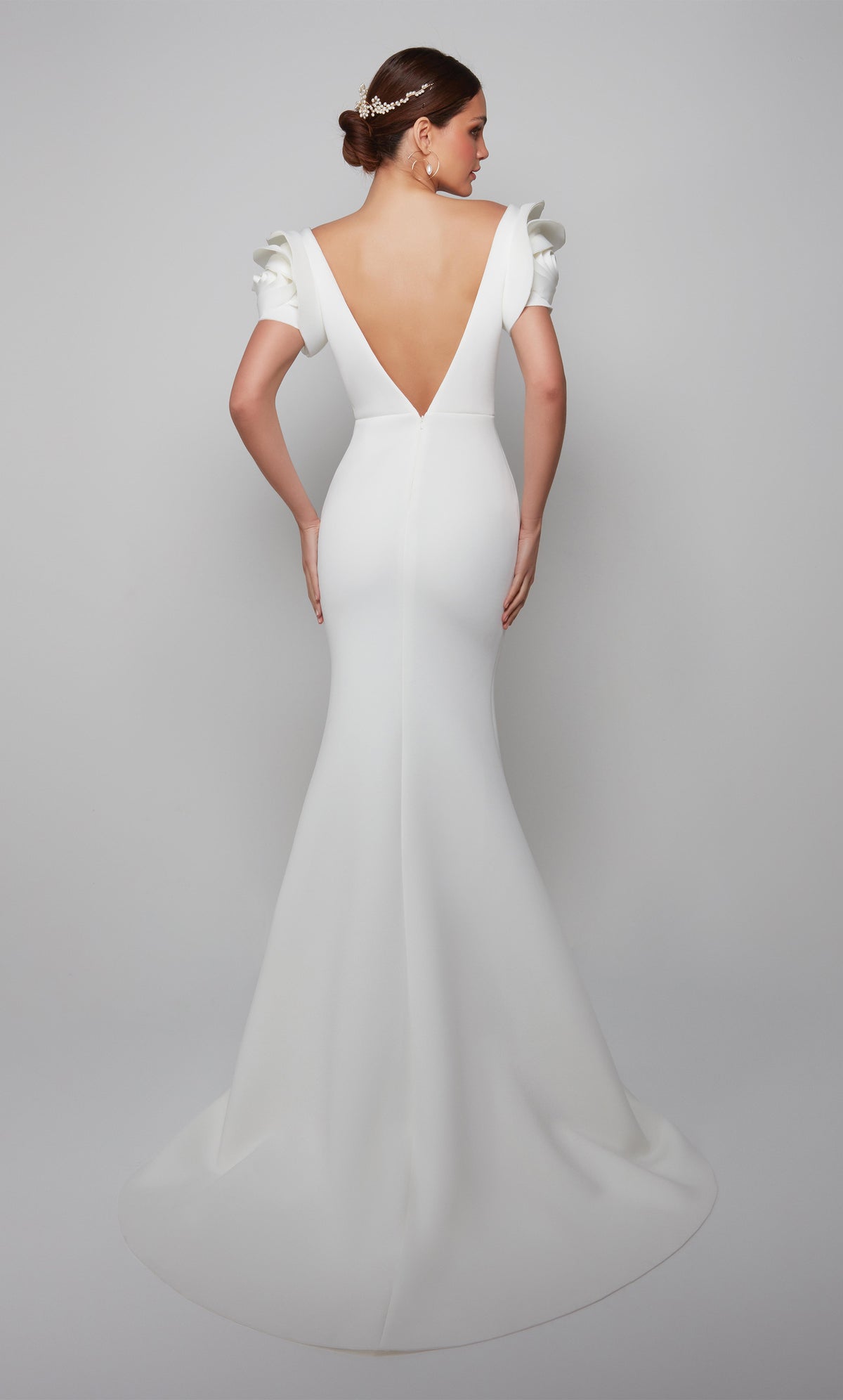Deep V back wedding dress with rose shaped sleeves and train in ivory.