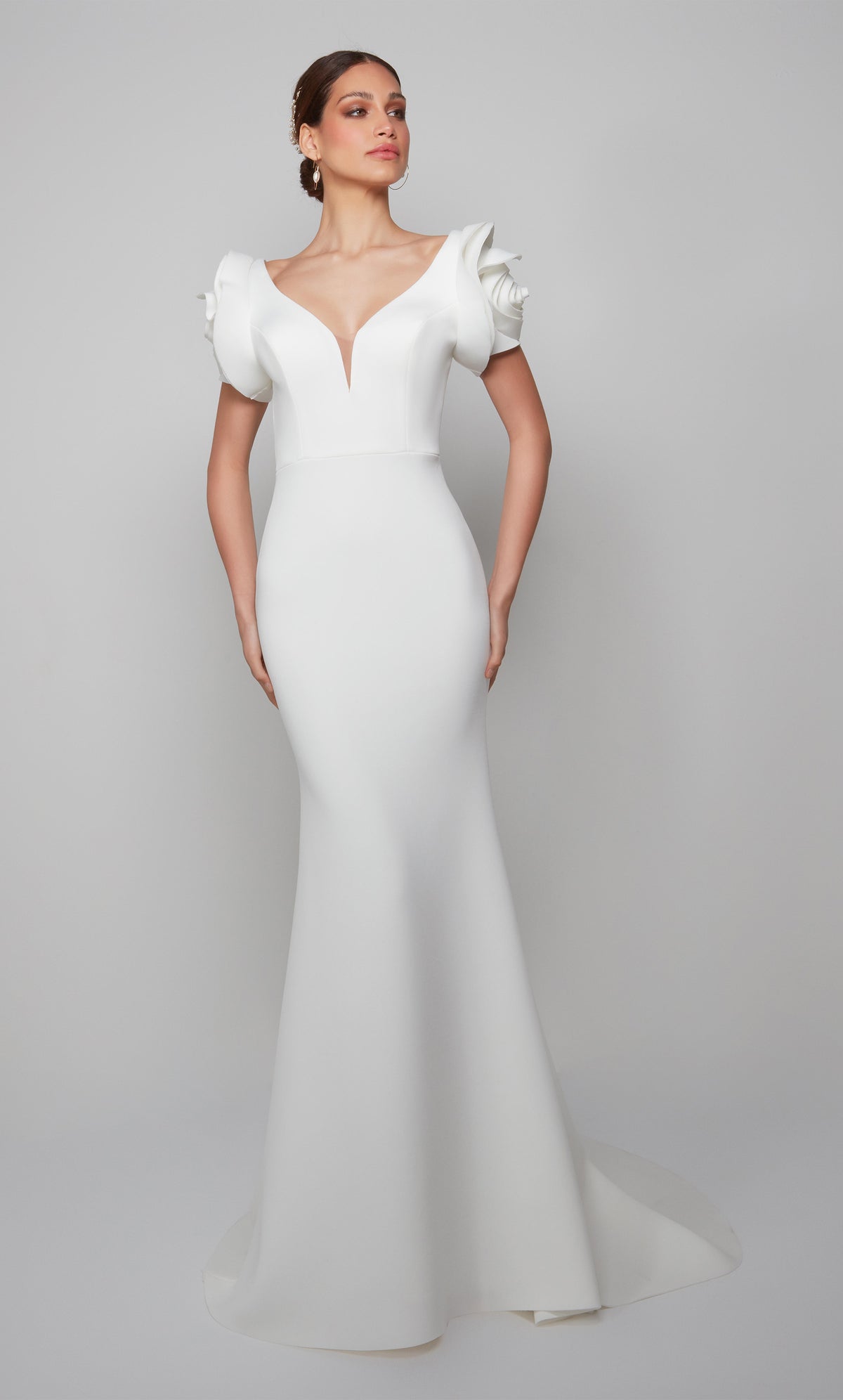 Ivory floral wedding dress with a plunging neckline and fit and flare silhouette.