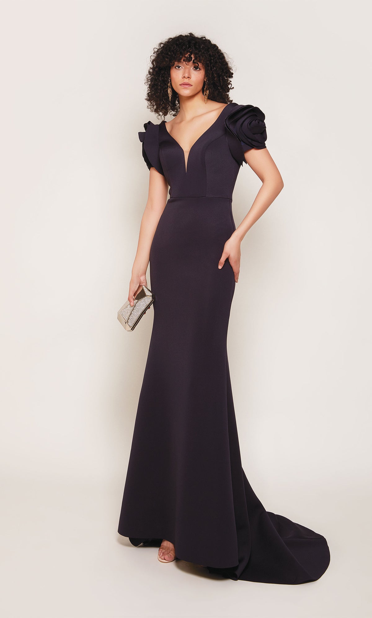 Midnight blue fit and flare scuba formal gown with rosette sleeves, an plunging neckline, and an fit and flare silhouette. Color-SWATCH_7066__MIDNIGHT