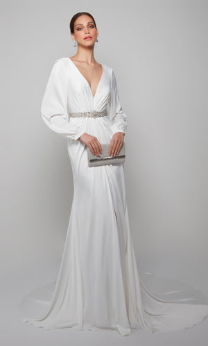 Plunging long sleeve wedding dress enhanced with a faux belt at the natural waist in white. Color-SWATCH_7070__DIAMOND-WHITE