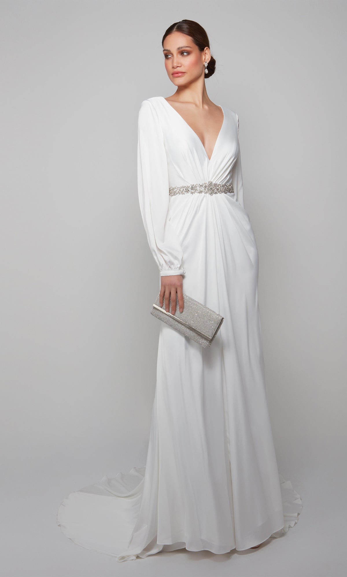 Long sleeve chic wedding dress with a plunging neckline and faux belt at the natural waistline in diamond white.