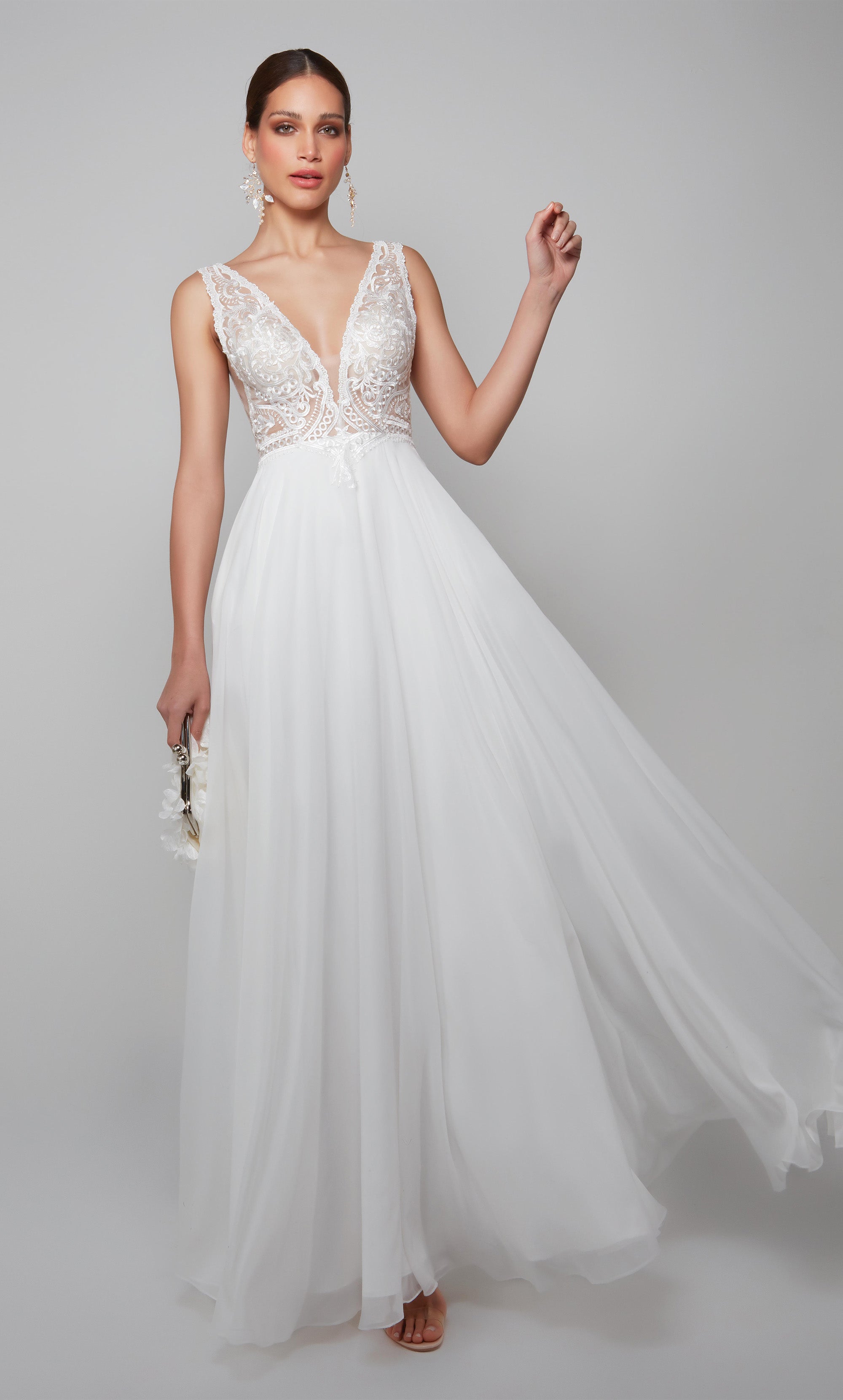 Flattering lace and chiffon wedding dress with V-neckline and