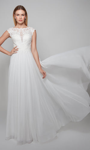 Classic wedding dress with elegant lace bodice and flowy chiffon skirt.