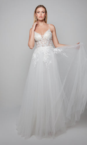 Sleeveless tulle wedding dress with a sheer lace bodice in ivory.