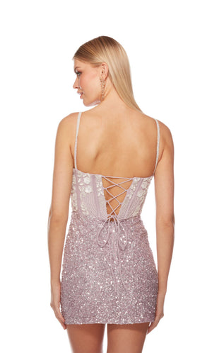Short hand-beaded light purple homecoming dress with an V neckline and lace up back for an chic and stylish look.