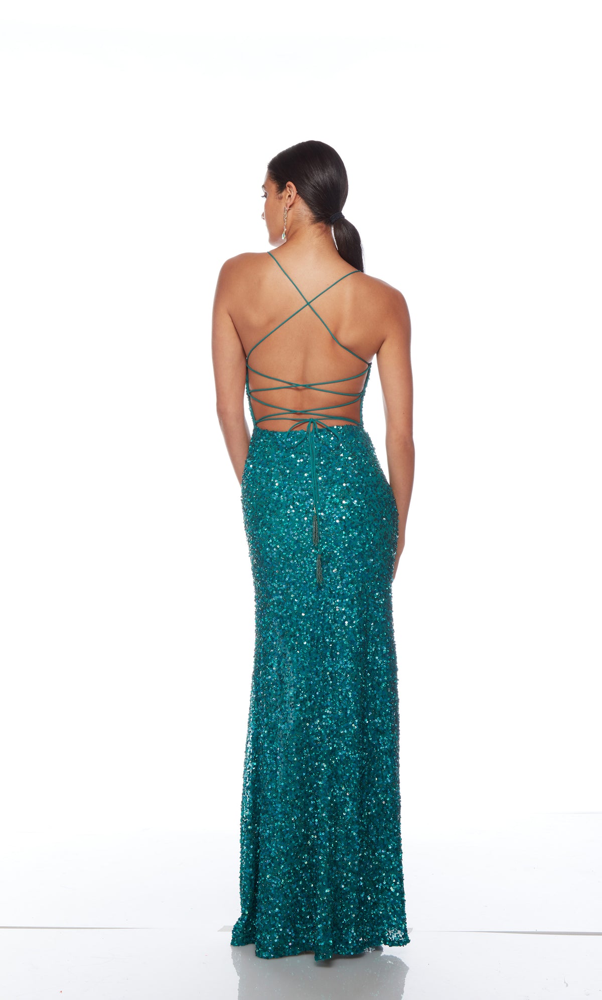 Blue-green sequin gown with scooped neckline, slit, and strappy lace-up back for an elegant and alluring look.