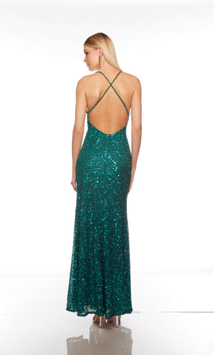 Blue sequin gown with an V neckline, slit, and crisscross adjustable strap back for an elegant and alluring look.