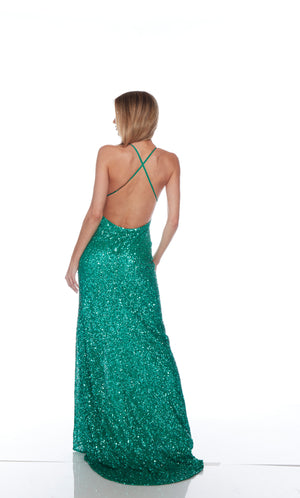 Green sequin gown with an V neckline, slit, and crisscross adjustable strap back, and an slight train for an elegant and alluring look.