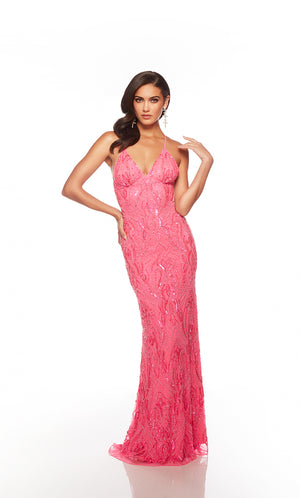 Elegant pink formal gown: Hand-beaded, V neckline, spaghetti straps, strappy back, and intricate paisley-patterned design for an chic and sophisticated look.