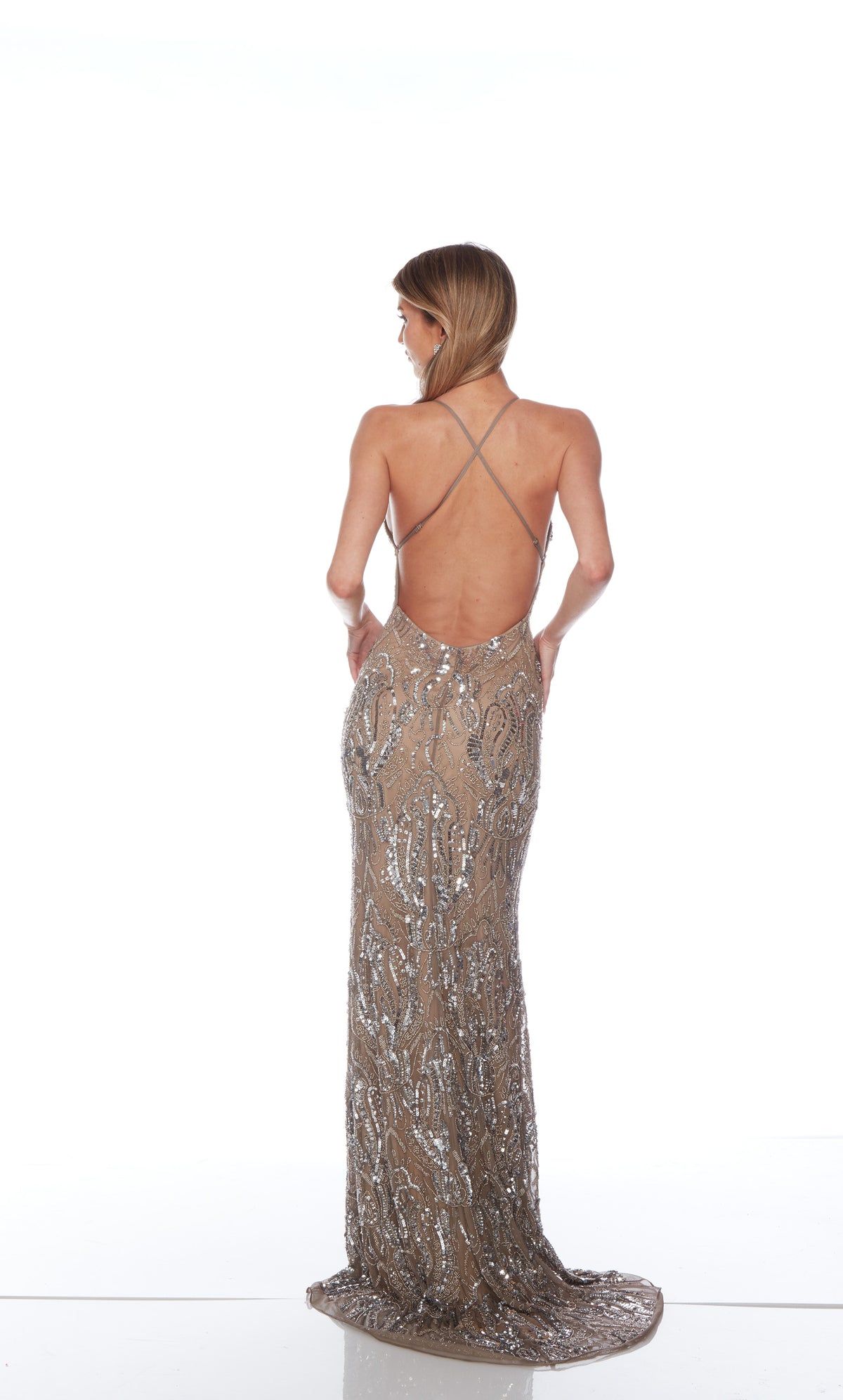 Elegant tan formal gown: Hand-beaded, V neckline, spaghetti straps, strappy back, and intricate paisley-patterned design for an chic and sophisticated look.