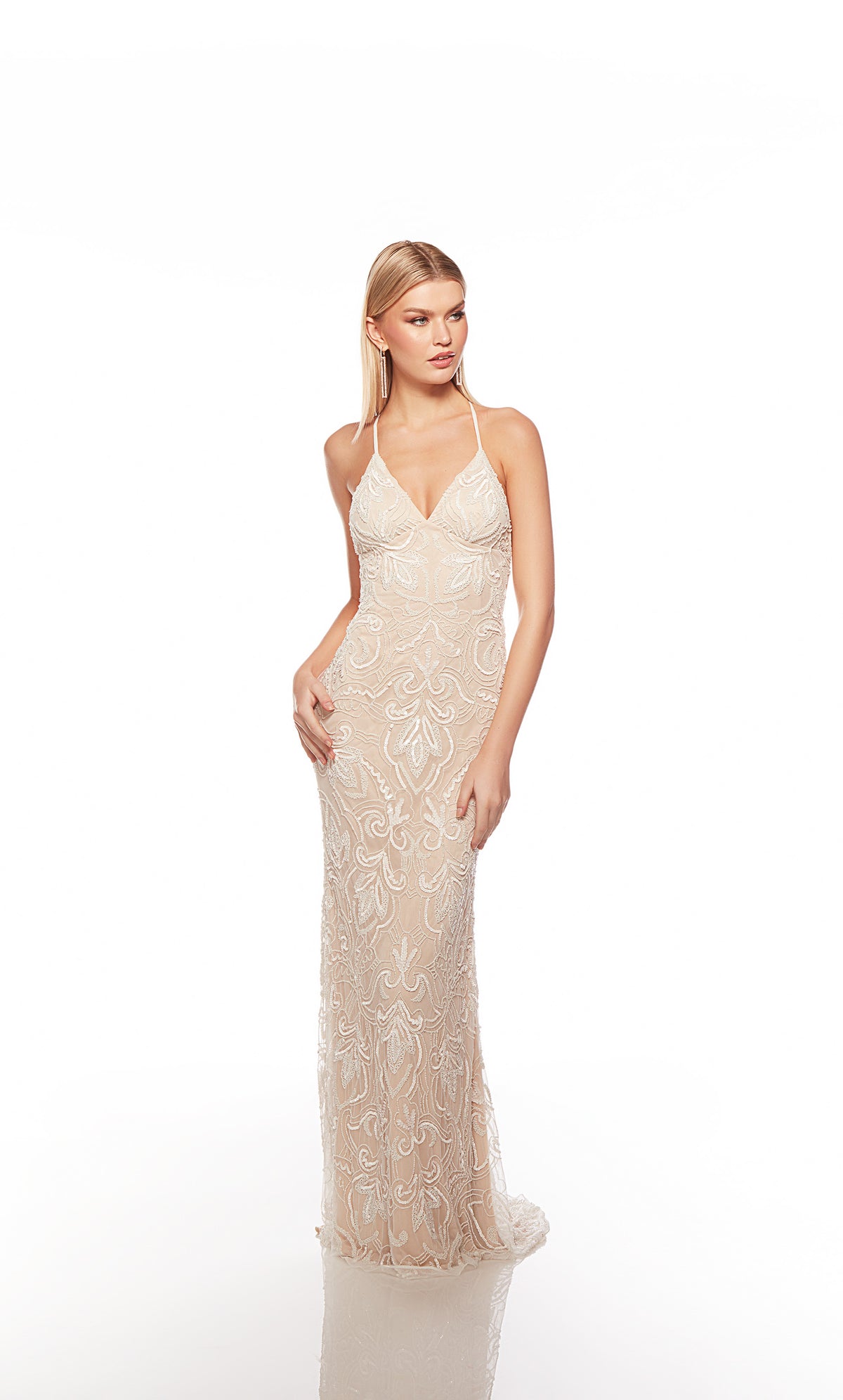 Elegant ivory-nude formal gown: Hand-beaded, V neckline, spaghetti straps, strappy back, and intricate floral design for an chic and sophisticated look.