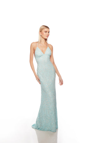 Elegant sky blue formal gown: Hand-beaded, V neckline, spaghetti straps, strappy back, and intricate design plus fringe accents for an chic and sophisticated look.