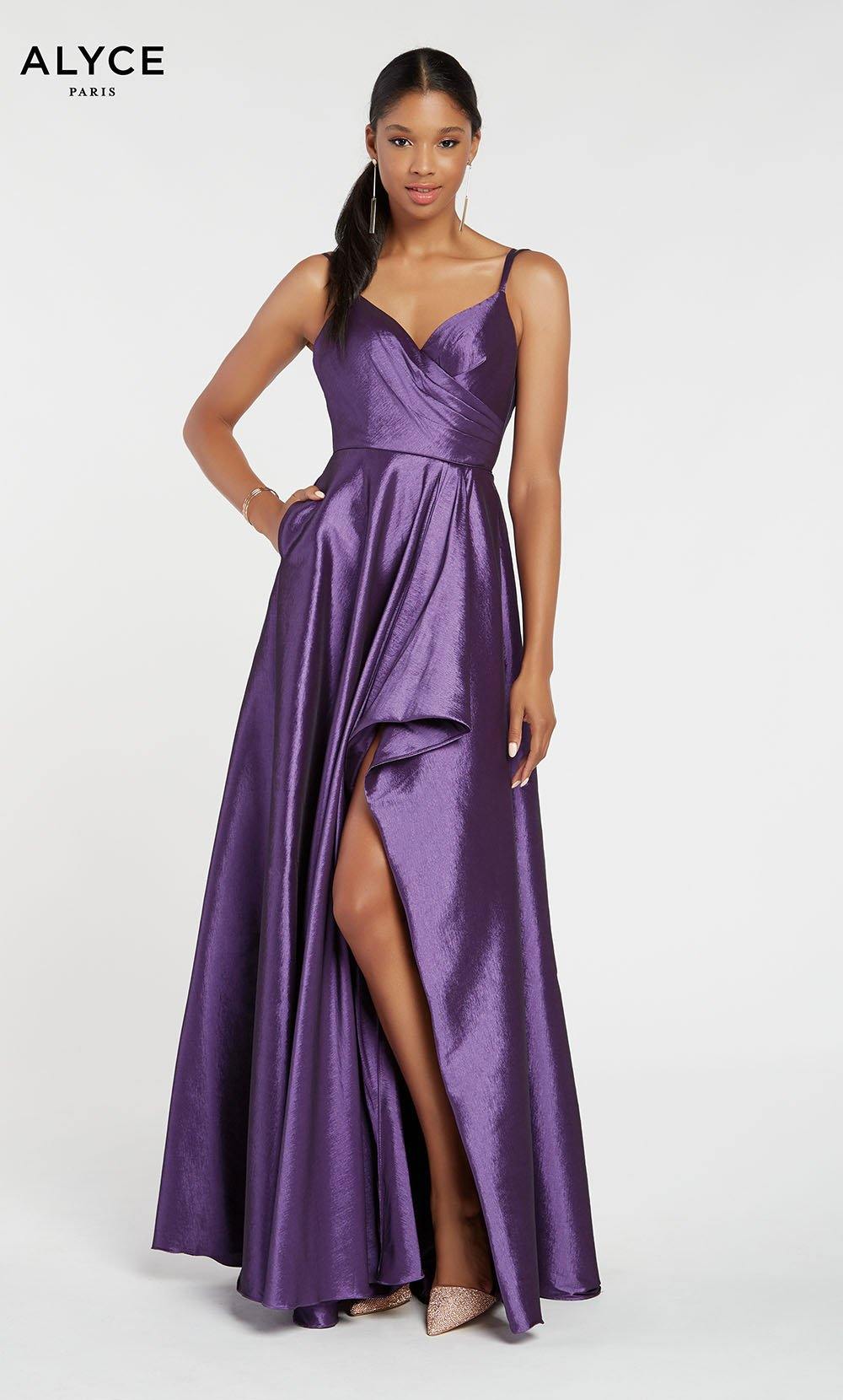 Plum high low prom dress with a sweetheart neckline, pockets, and a stretch taffeta fabrication. SWATCH_60094__PLUM